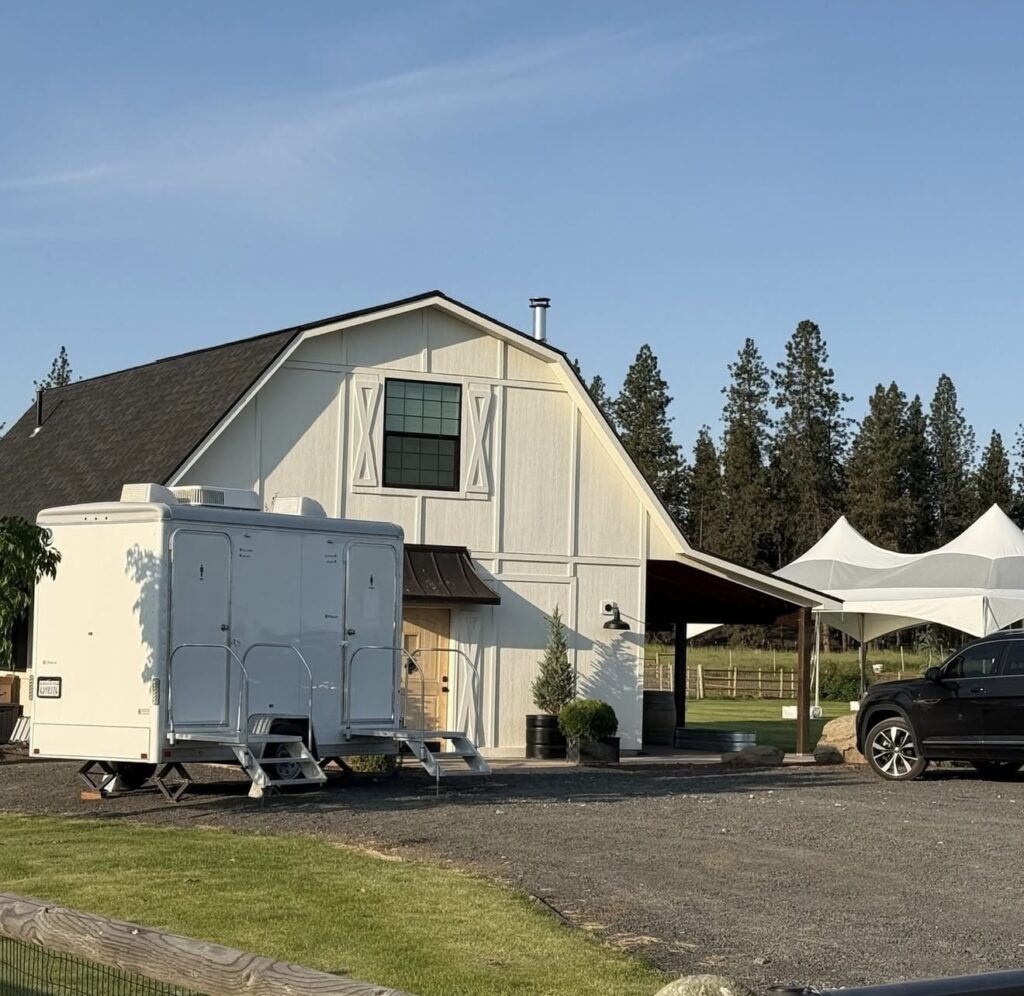 VIP Restrooms luxury restroom trailer at an outdoor wedding in Spokane